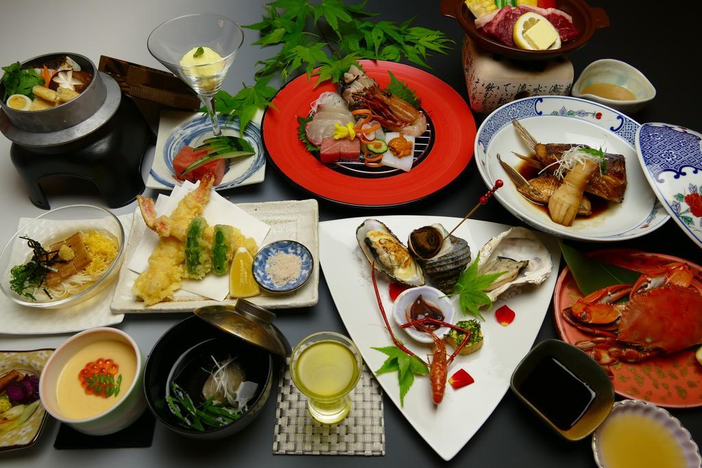 Kikunoya Hotel Hatsukaichi Bagian luar foto
