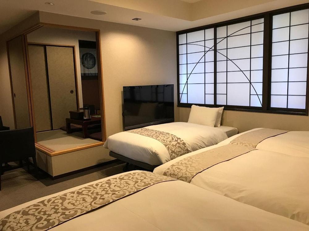 Kikunoya Hotel Hatsukaichi Bagian luar foto