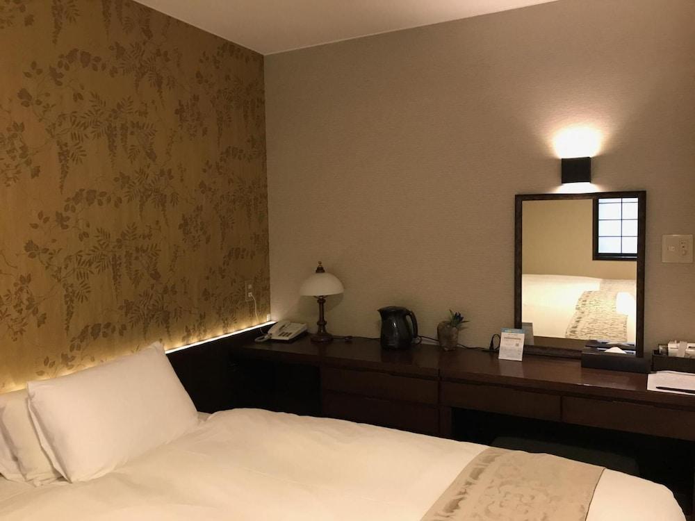 Kikunoya Hotel Hatsukaichi Bagian luar foto