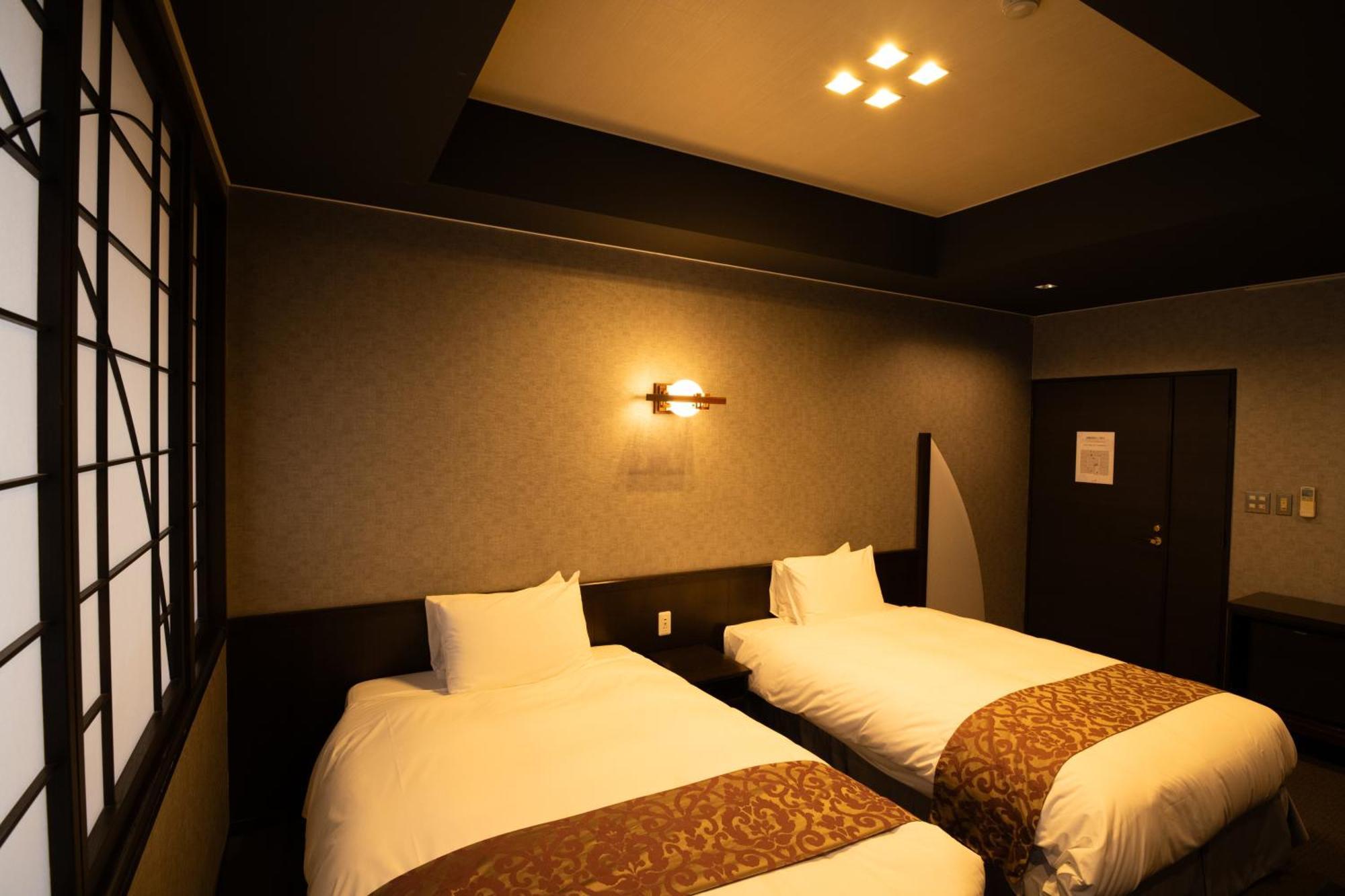 Kikunoya Hotel Hatsukaichi Bagian luar foto