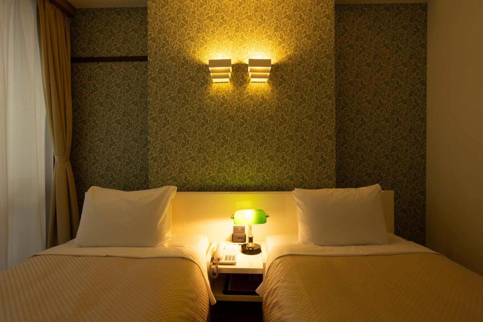 Kikunoya Hotel Hatsukaichi Bagian luar foto