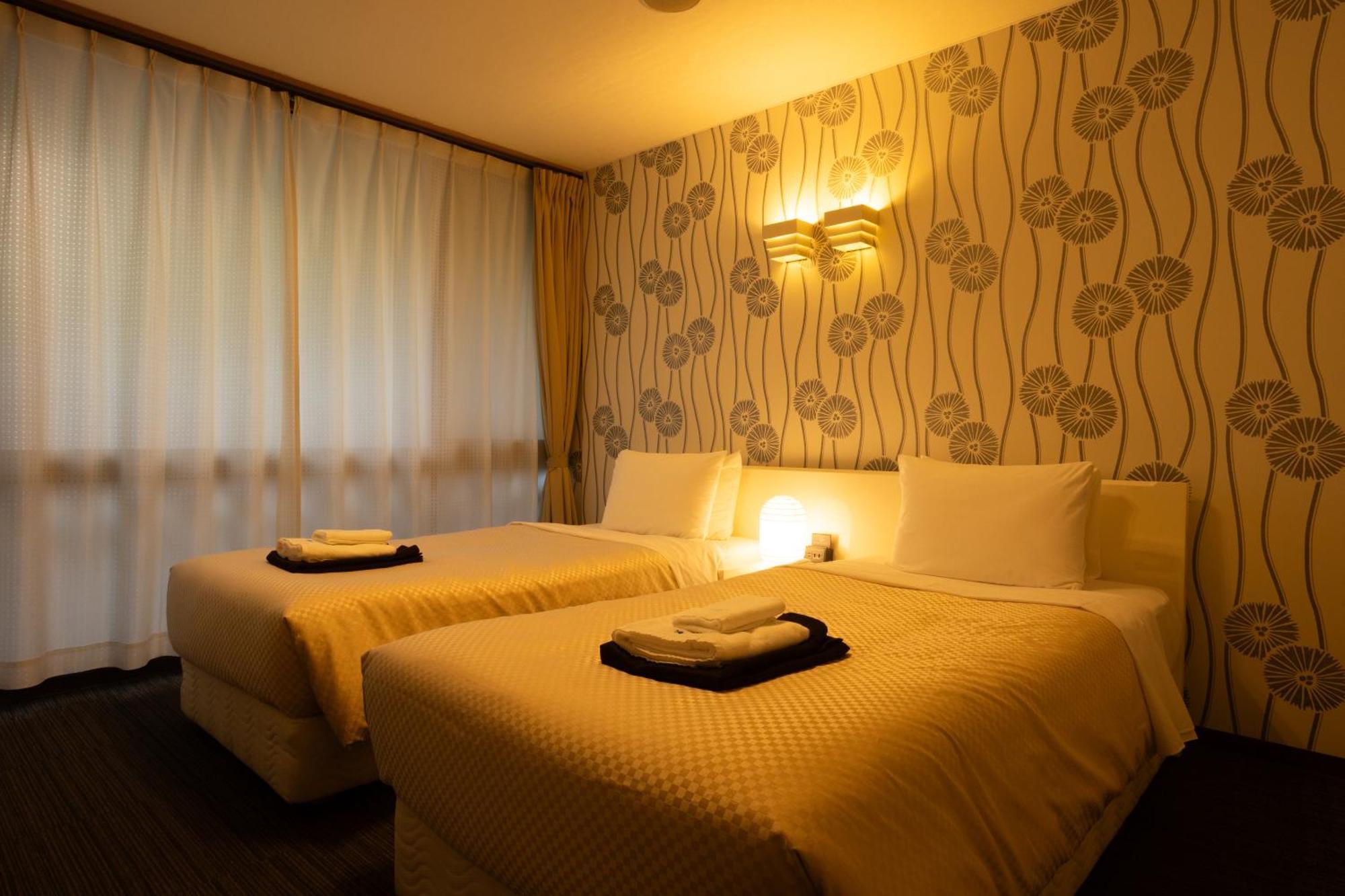 Kikunoya Hotel Hatsukaichi Bagian luar foto