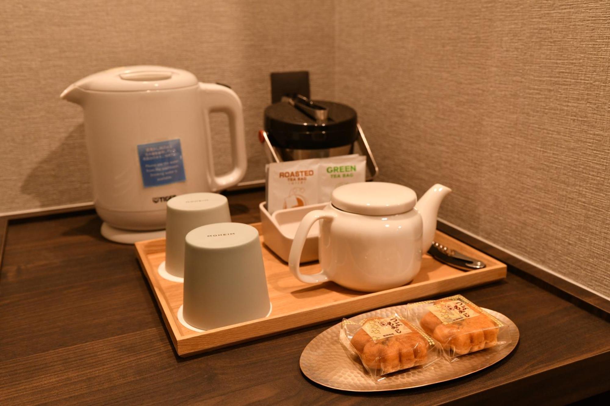 Kikunoya Hotel Hatsukaichi Bagian luar foto