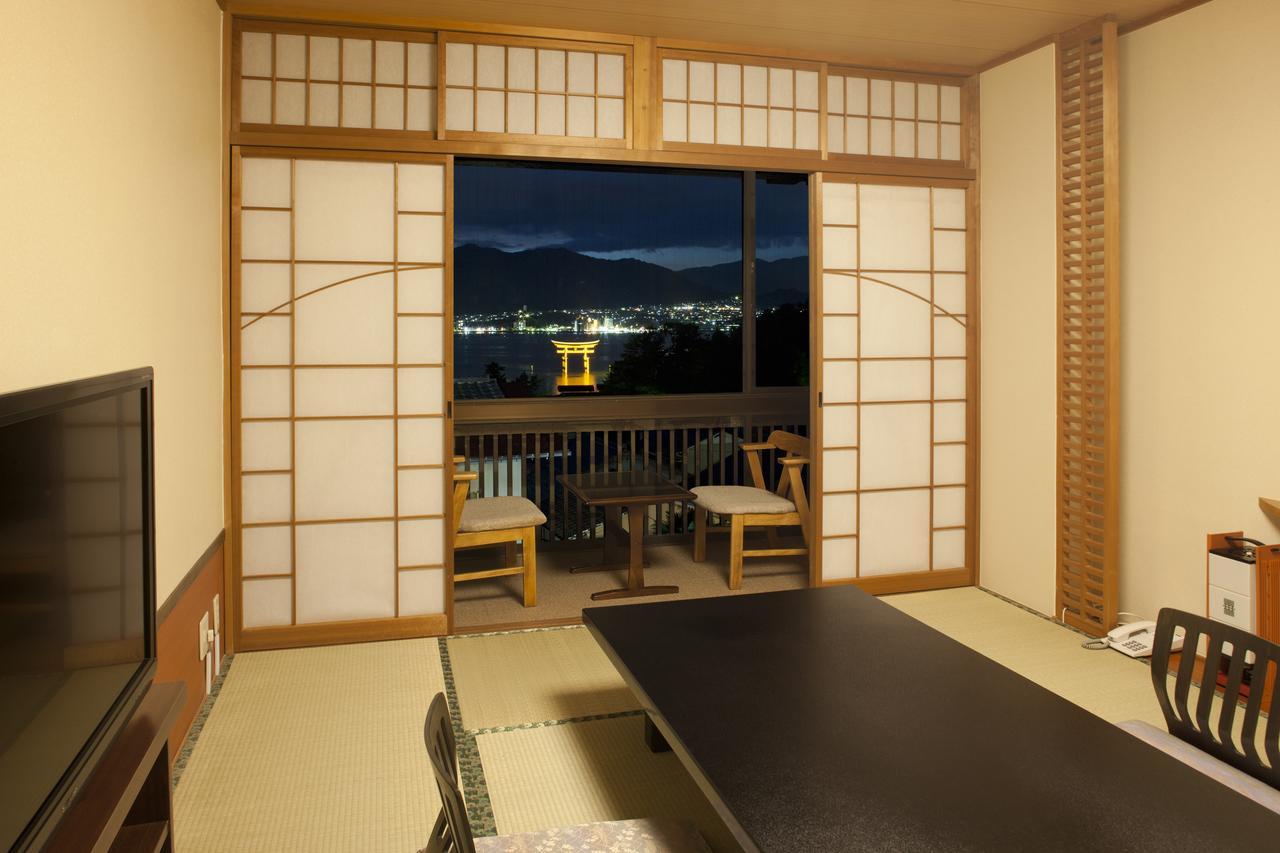 Kikunoya Hotel Hatsukaichi Bagian luar foto